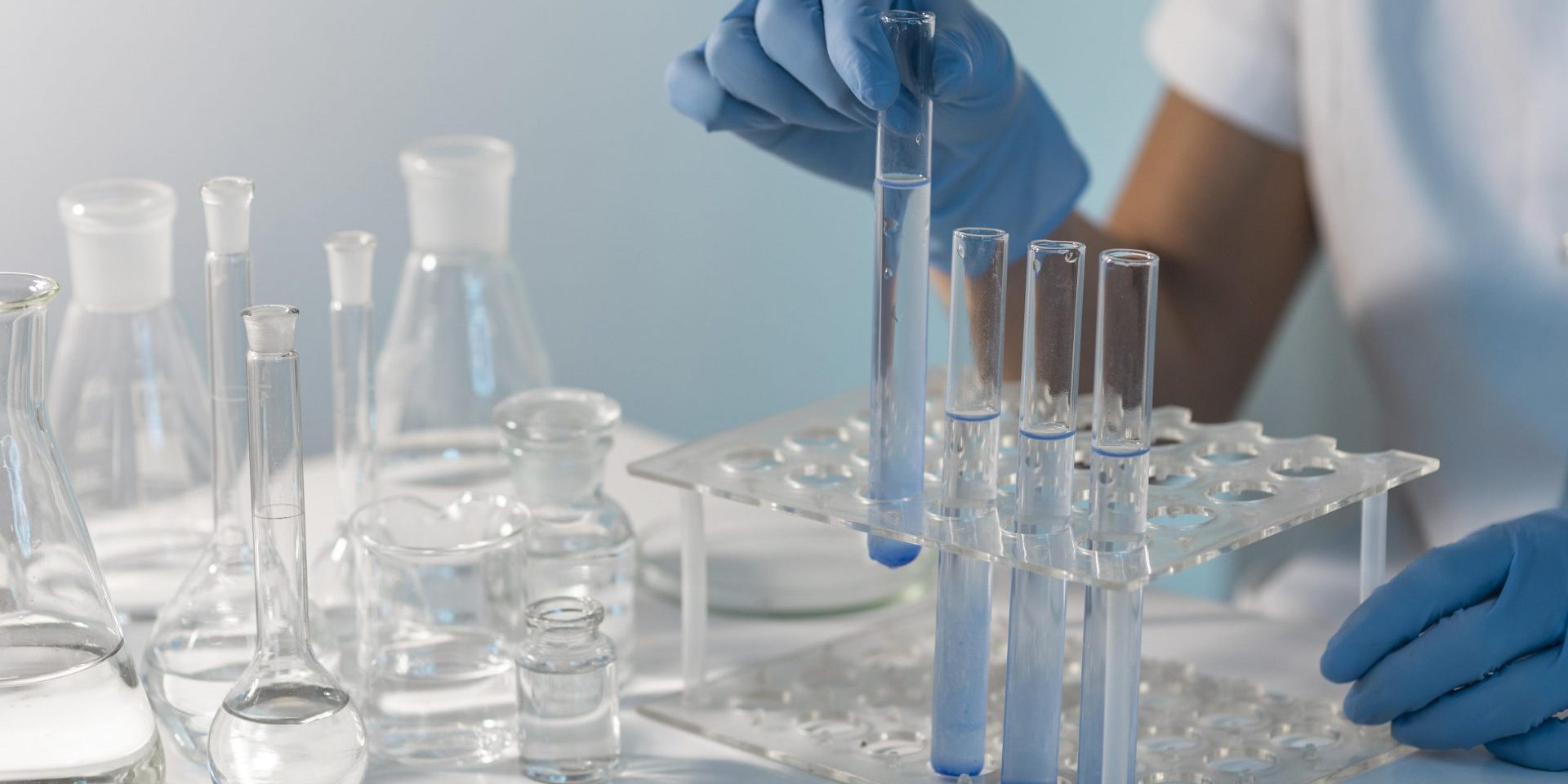 close-up-hand-holding-lab-tube