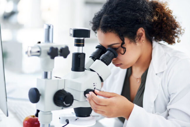 science-research-woman-with-microscope-lab-medical-pathogen-exam-clinical-trial-pharmaceutical-scientist-innovation-biotech-with-analysis-mpox-vaccine-test-epidemiology